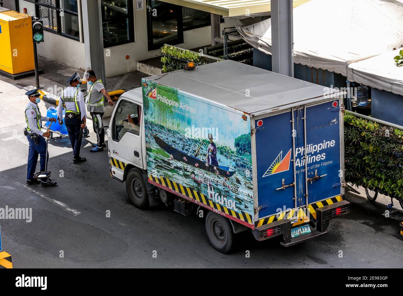 Manila, Philippines. 3rd Feb, 2021. A truck of the Philippine Airlines (PAL) is seen at the Manila Ninoy Aquino International Airport (NAIA) terminal 1 in Paranaque City, the Philippines, Feb. 3, 2021. The PAL is going to let go of 2,300 employees in mid-March, as part of its recovery initiative amid losses due to the pandemic, the company announced on Tuesday. The airline said the affected employees represent about 30 percent of its workforce and that the total includes voluntary separations and involuntary retrenchment. Credit: Rouelle Umali/Xinhua/Alamy Live News Stock Photo