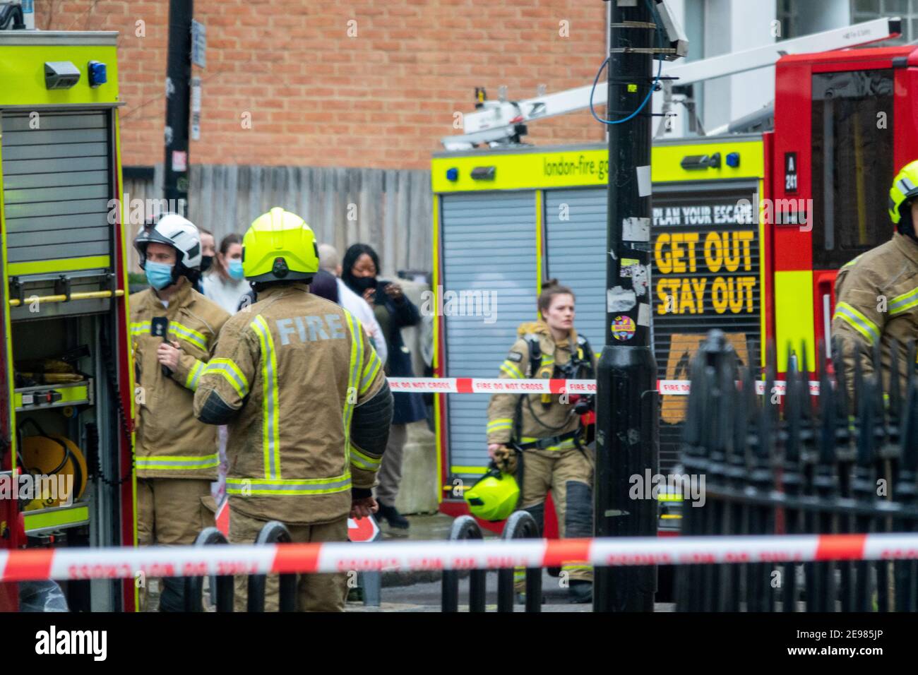 London, U.K. 3rd February 2021. London Fire Brigade called to fourth floor flat fire in Endsleigh Gardens, Bloomsbury. Five fire engines and 35 firefighters attended with residents of the building being evacuated and some treated for shock with metallic thermal blankets by London Ambulance Service. Credit: Bradley Taylor / Alamy Live News Stock Photo
