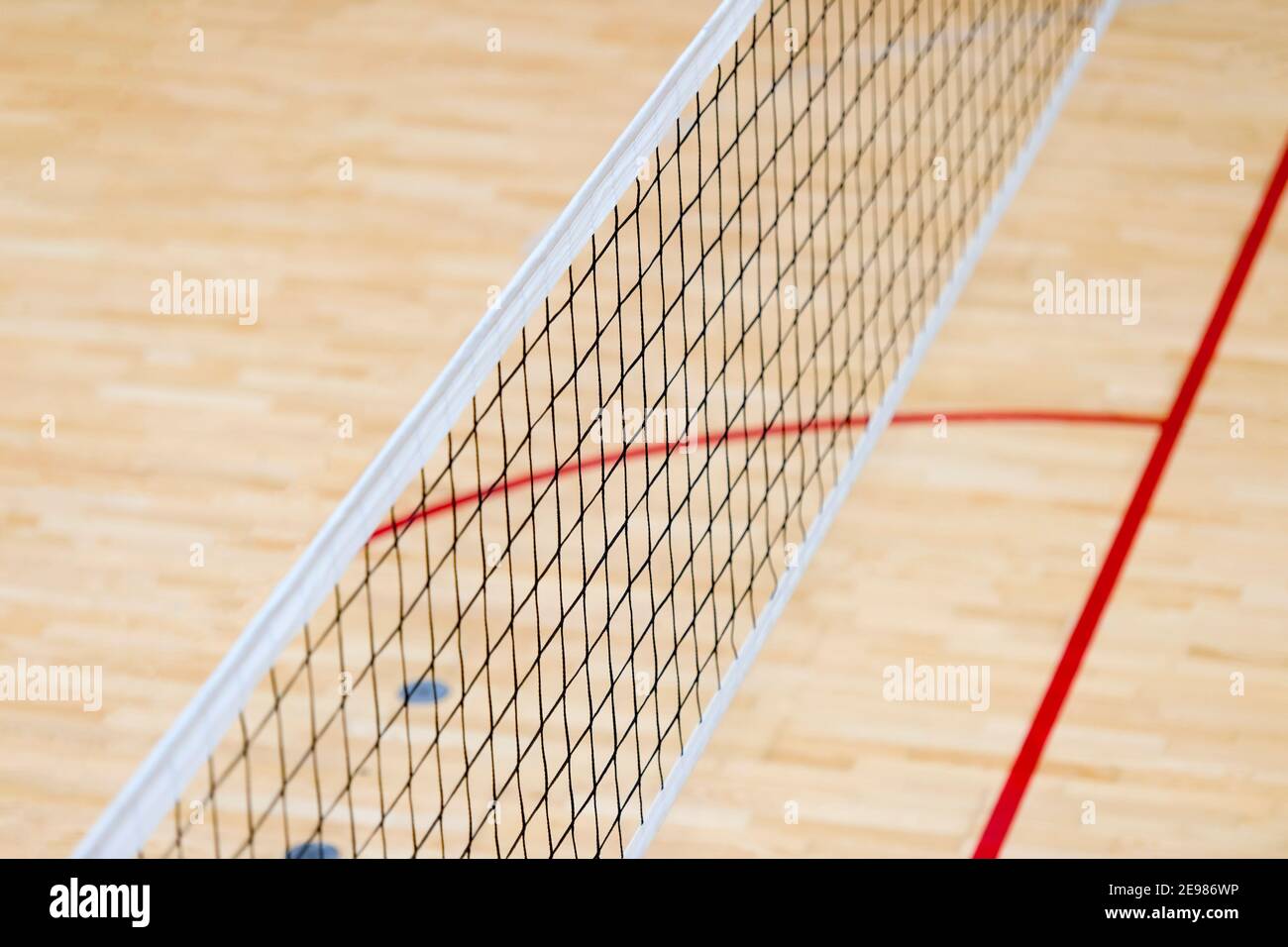 Elementary school gym indoor with volleyball net. Team sport concept Stock Photo