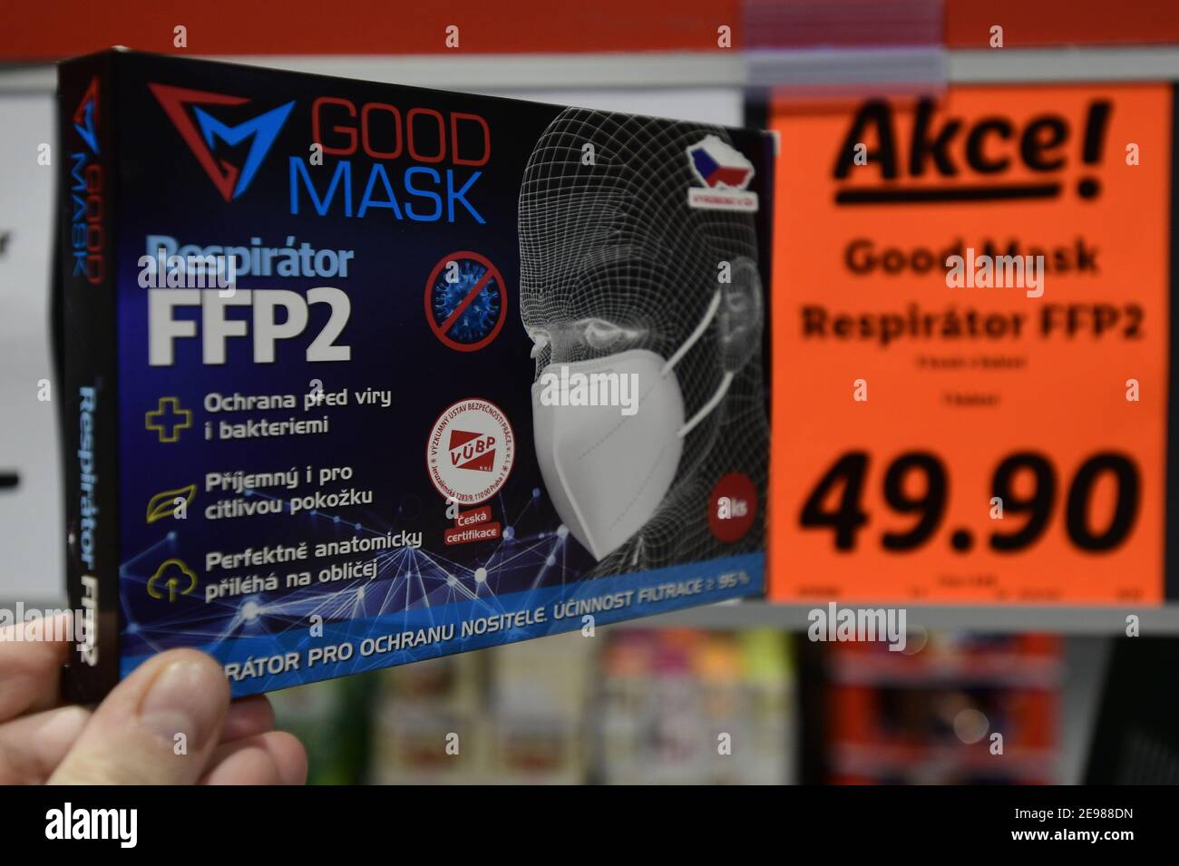 Packaged respirators of FFP2 category are seen on February 3, 2021, in Lidl supermarket in Prague, Czech Republic. Large pharmacy networks and some online stores cut prices of FFP2 and higher category respirators that are exempt from a 21 percent VAT rate for two months starting today as one of the government's anti-coronavirus measures, a CTK poll of businesses has shown. (CTK Photo/Roman Vondrous) Stock Photo