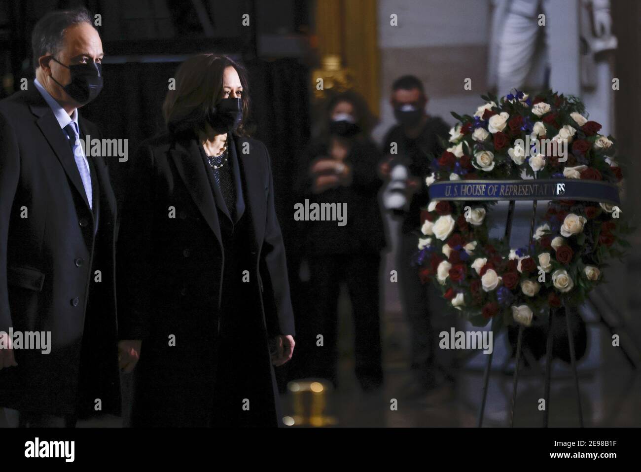 Washington, United States. 03rd Feb, 2021. US Vice President Kamala Harris and second gentleman Doug Emhoff pay respects at the remains of Capitol Police officer Brian Sicknick lie in honor in the Rotunda of the US Capitol building after he died during the January 6th attack on Capitol Hill by a pro-Trump mob February 3, 2021, in Washington, DC. Pool Photo by Carlos Barria/UPI Credit: UPI/Alamy Live News Stock Photo