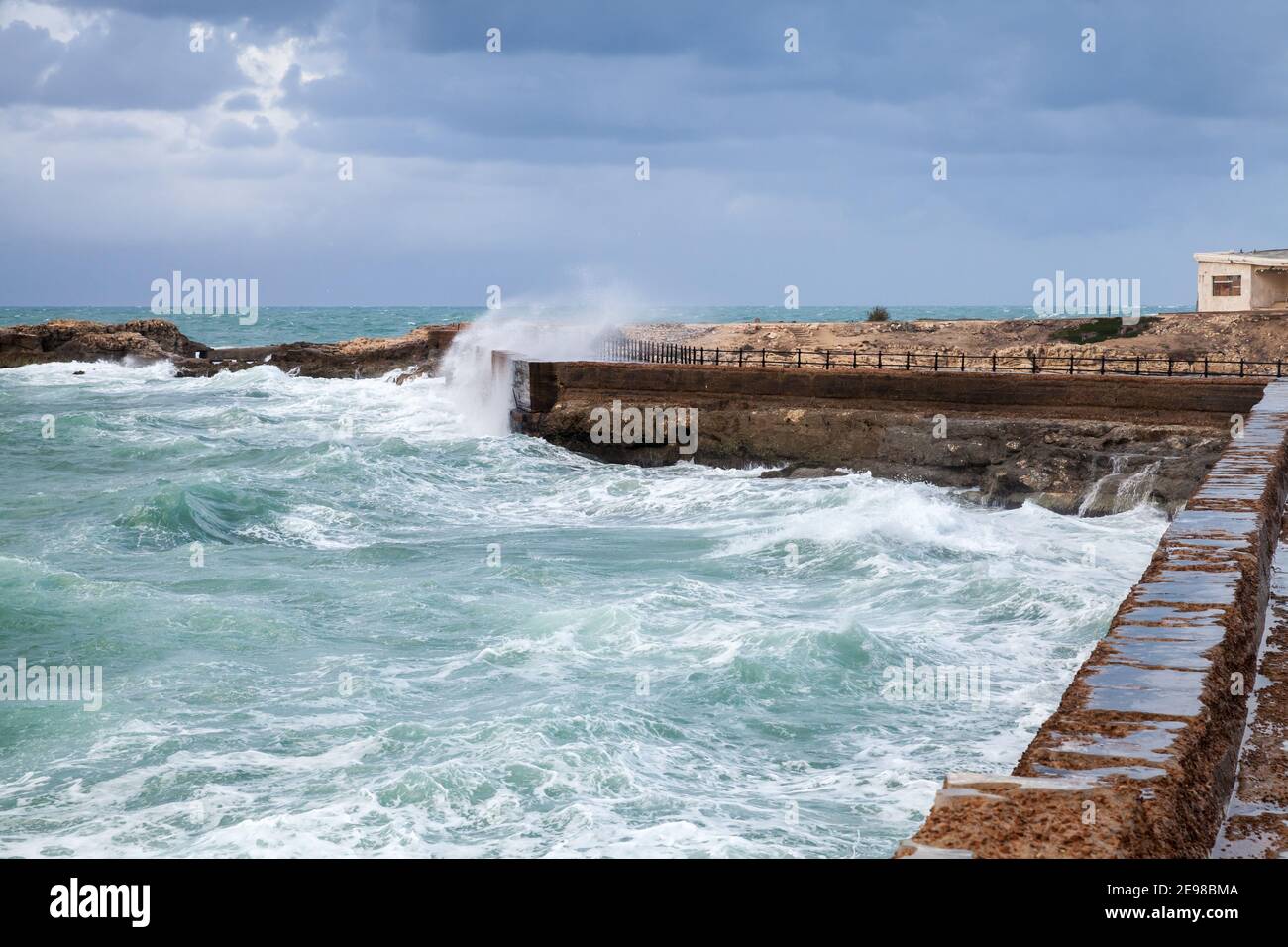 Alexandria, Egypt. Coastal landscape with splashing waves at stormy