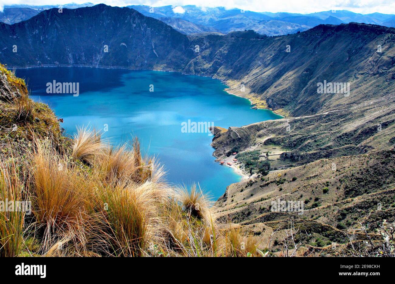 View of a water-filled crater lake and the most western volcano in the Ecuadorian Andes Stock Photo
