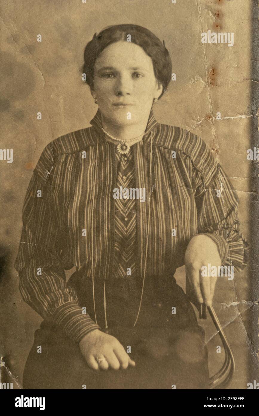 France - CIRCA 1920s: Young women portrait in studio Vintage Carte de Viste Edwardian era photo Stock Photo