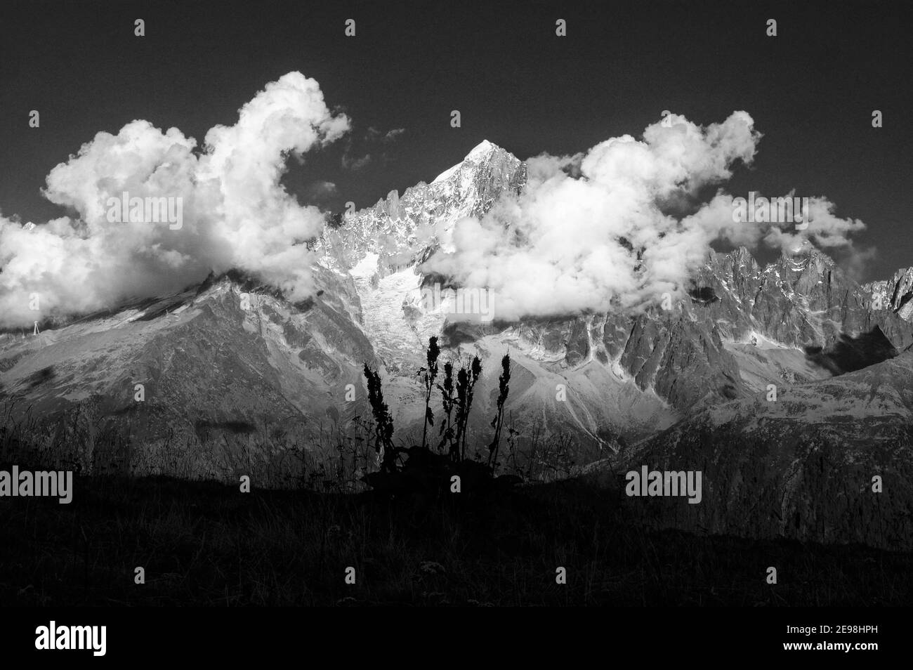 Late afternoon clouds forming around the summits of the Chamonix