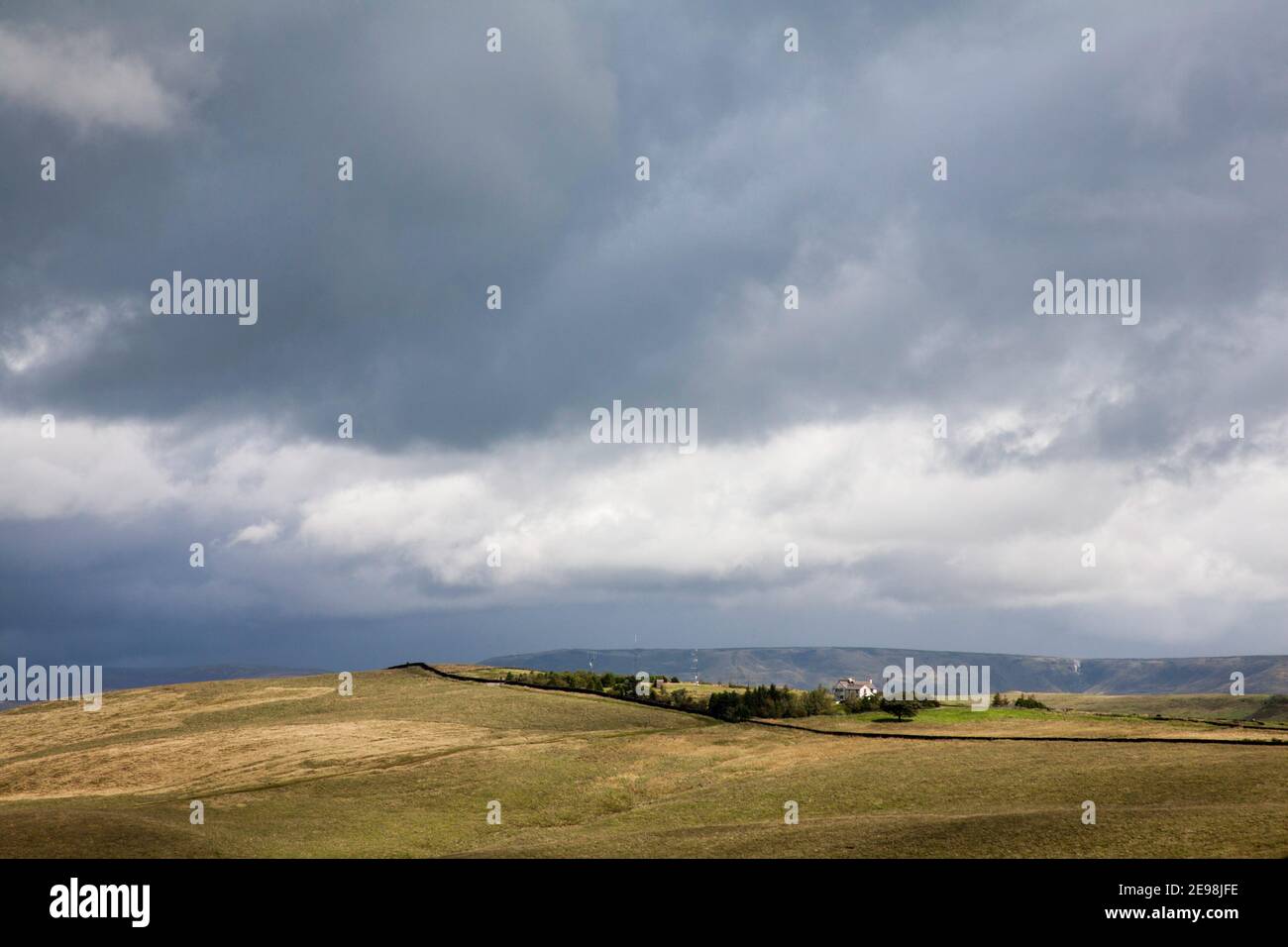 Storm clouds passing over Bowstonegate with Kinder Scout in the background Lyme Handley Lyme Park viewed from Sponds Hill Cheshire England Stock Photo