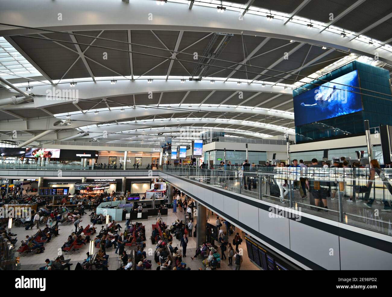Passenger departures waiting area and checkin counters at Heathrow