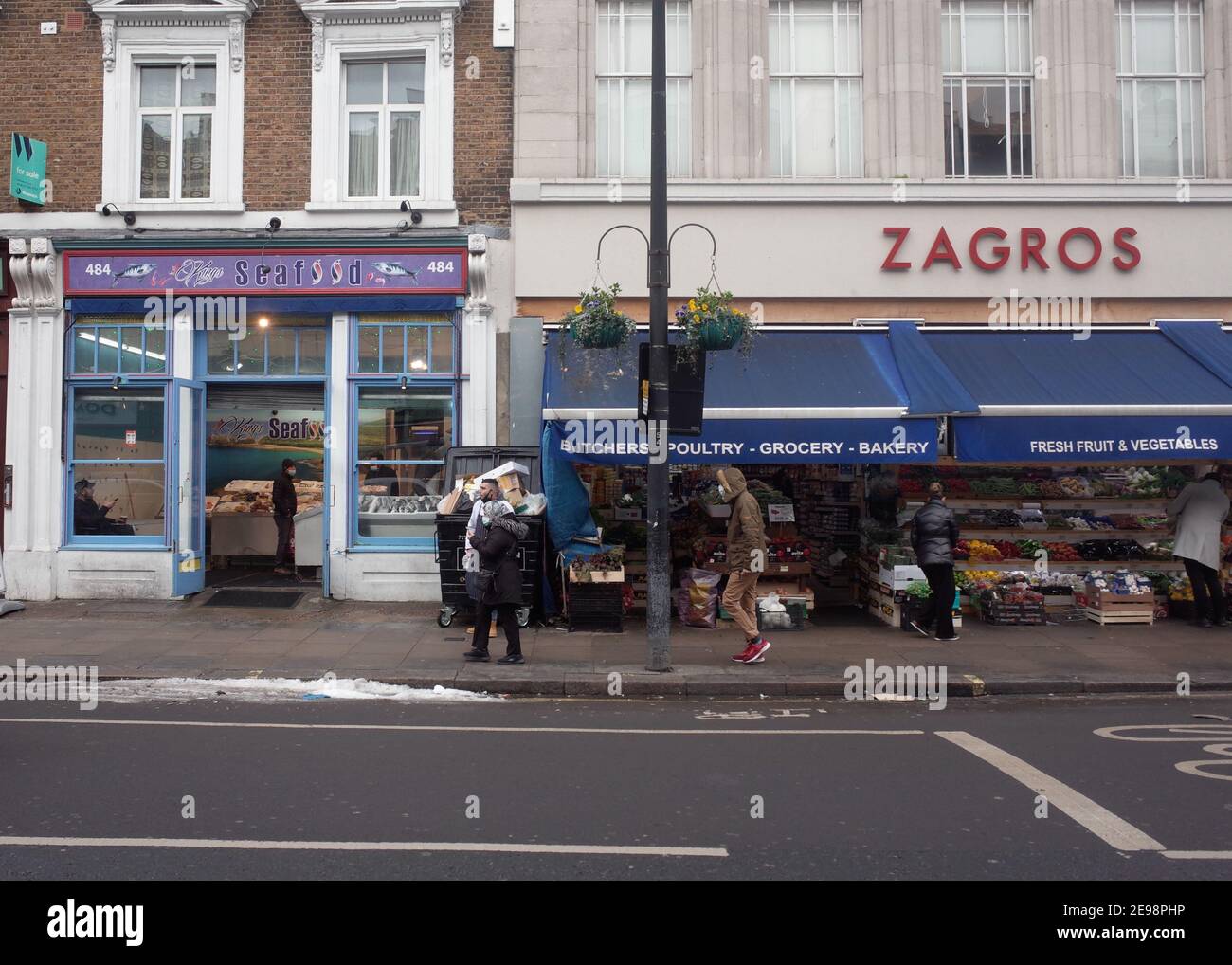 London Harrow Road, a long street of high street shops in west London
