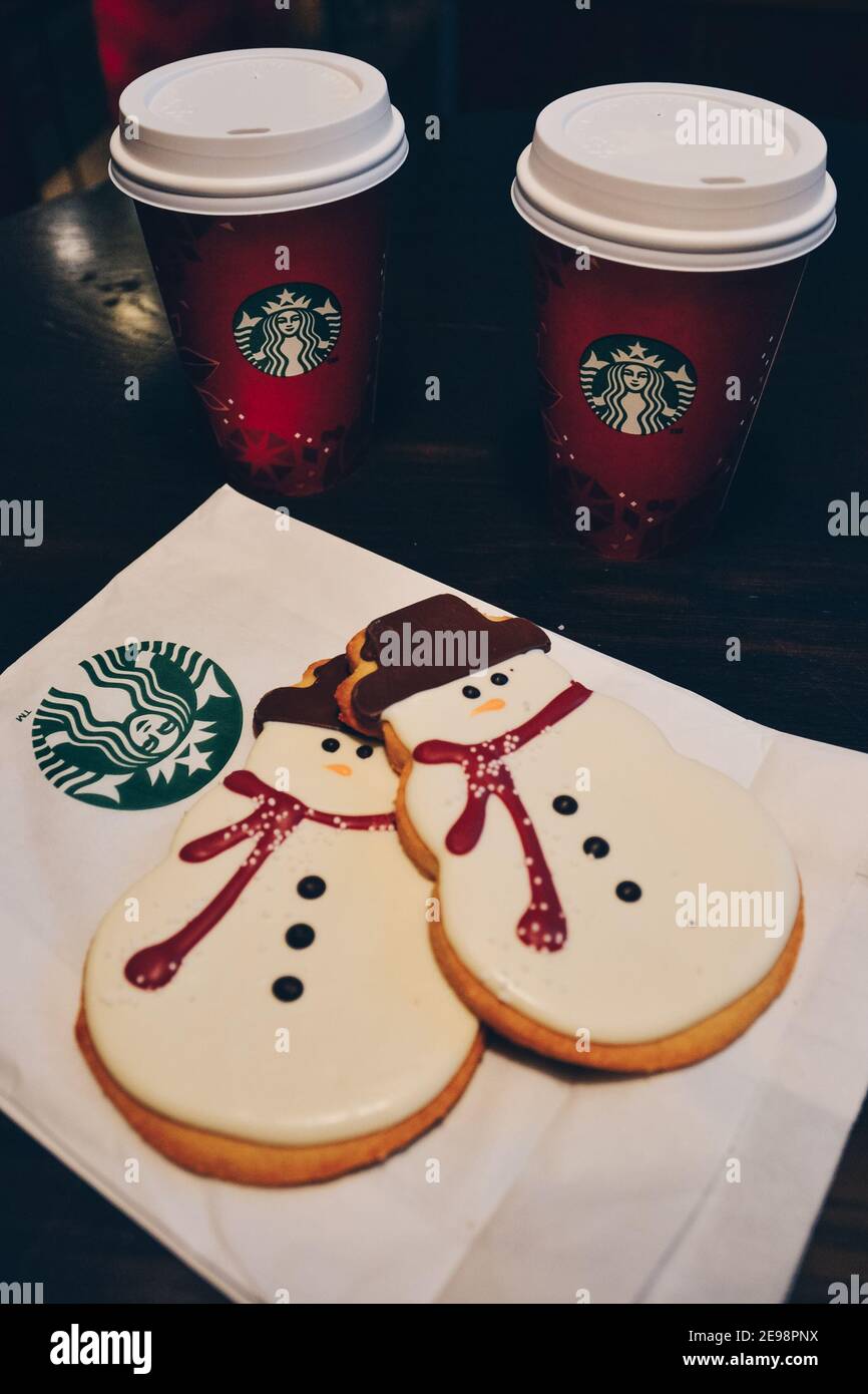 Snowman cookies and coffee from Starbucks Stock Photo Alamy