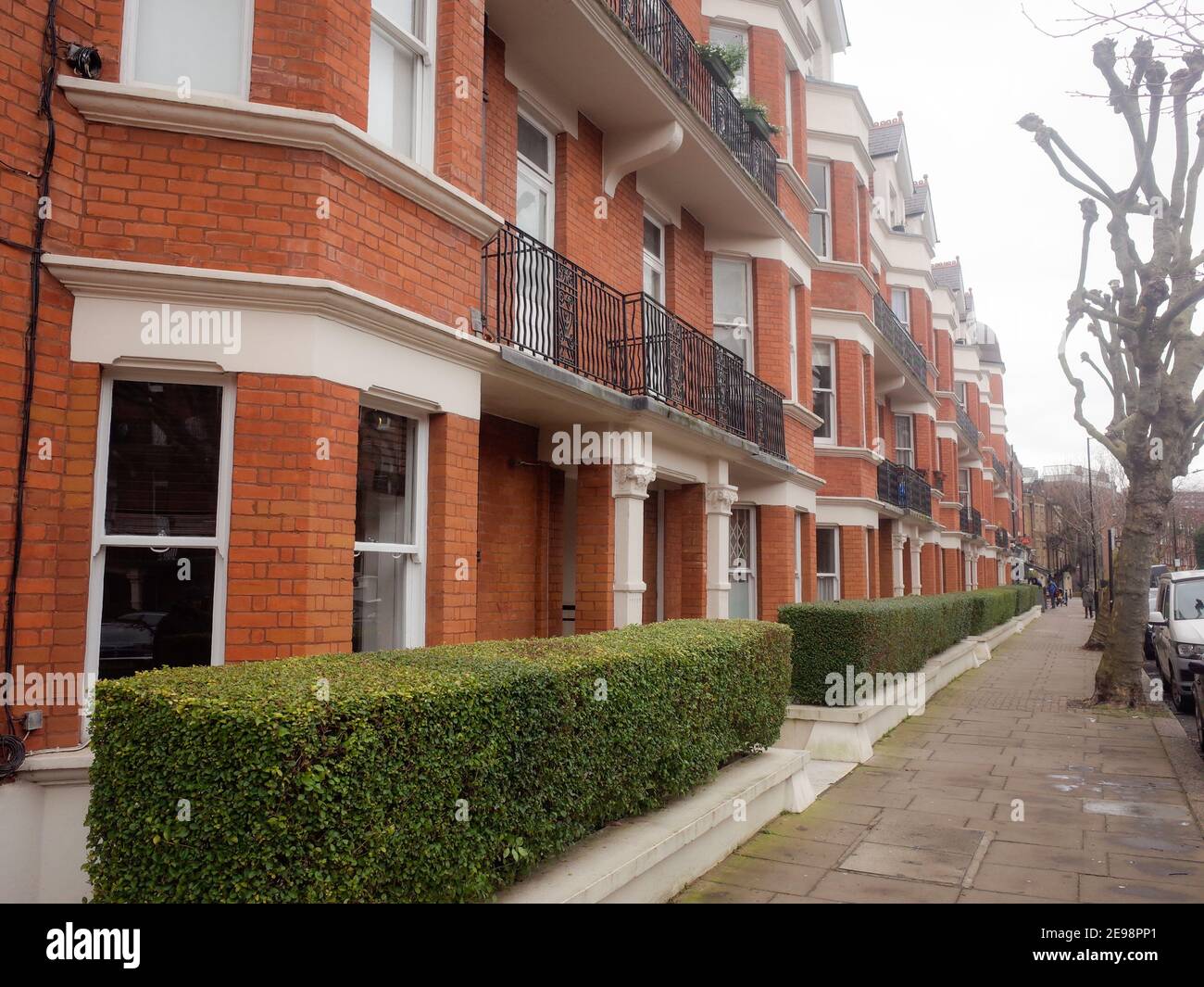 London- Street of upmarket red brick townhouses in Maida Vale area of Paddington, North West London Stock Photo