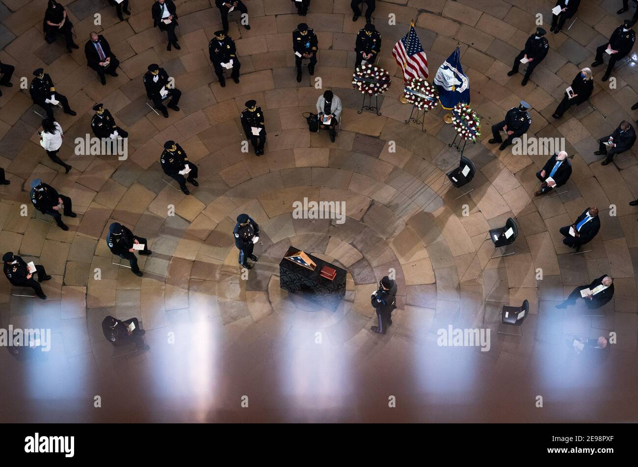 Capitol Hill Police Officer Brian Sicknick lies in honor in the Rotunda of the U.S. Capitol Building in Washington, DC on Tuesday, February 3, 2021. Sicknick died from injures sustained during the January 6 riot at the U.S. Capitol.Credit: Kevin Dietsch/Pool via CNP | usage worldwide Stock Photo