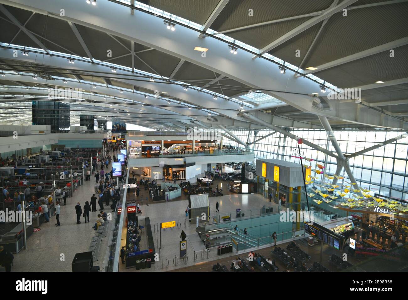 Passenger departures waiting area and checkin counters at Heathrow