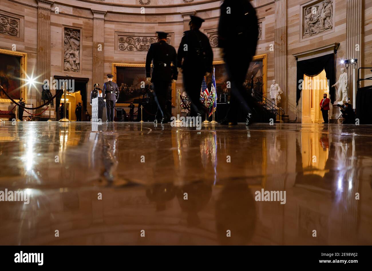 Washigton, USA. 03rd Feb, 2021. U.S. Capitol Police Officers arrive to pay their respects as the remains of Capitol Police officer Brian Sicknick lay in honor in the Rotunda of the U.S. Capitol building after he died on Jan. 7 from injuries he sustained while protecting the U.S. Capitol during the Jan. 6 attack on the building, in Washington, DC, U.S. February 3, 2021. (Photo by Carlos Barria/Pool/Sipa USA) Credit: Sipa USA/Alamy Live News Stock Photo