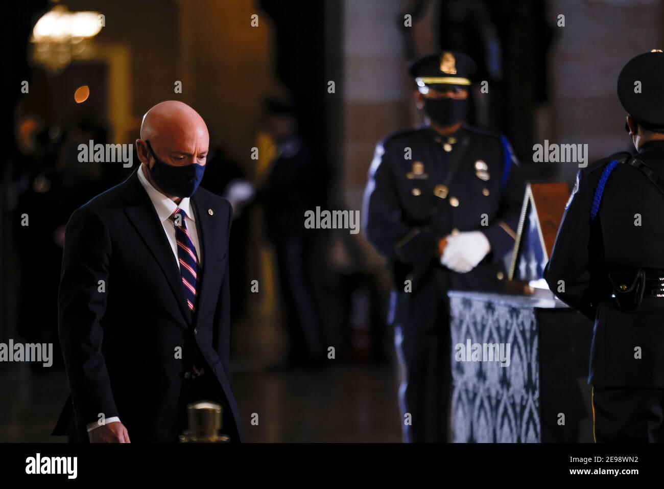 Washigton, USA. 03rd Feb, 2021. U.S. Senator-elect Mark Kelly (D-AZ) leaves after paying respects as the remains of Capitol Police officer Brian Sicknick lay in honor in the Rotunda of the U.S. Capitol building after he died on Jan. 7 from injuries he sustained while protecting the U.S. Capitol during the Jan. 6 attack on the building, in Washington, DC, U.S. February 3, 2021. (Photo by Carlos Barria/Pool/Sipa USA) Credit: Sipa USA/Alamy Live News Stock Photo