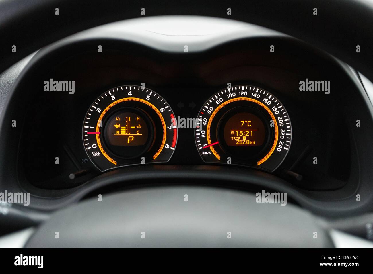 Dashboard closeup, car interior, red light Stock Photo Alamy