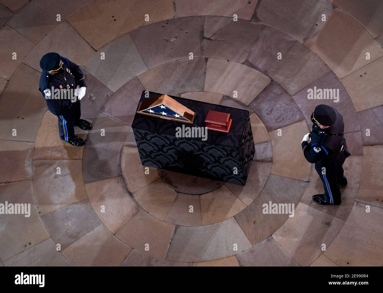 Capitol Hill Police Officer Brian Sicknick lies in honor in the Rotunda of the U.S. Capitol Building in Washington, DC on Tuesday, February 3, 2021. Sicknick died from injures sustained during the January 6 riot at the U.S. Capitol.Credit: Kevin Dietsch/Pool via CNP /MediaPunch Stock Photo