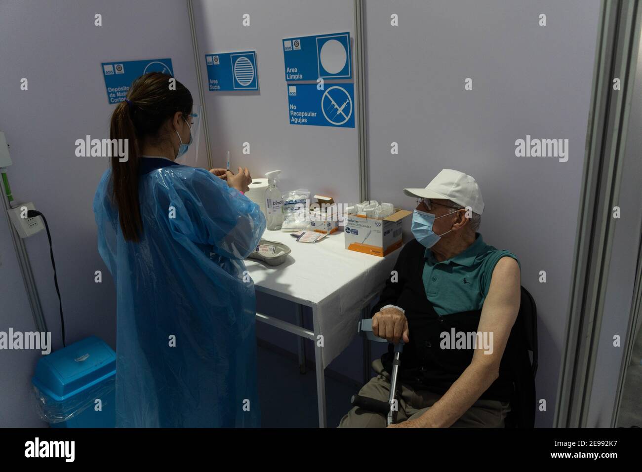 Santiago, Metropolitana, Chile. 3rd Feb, 2021. An older adult is vaccinated with Sinovac, on the first day of mass vaccination against covid in Chile. Credit: Matias Basualdo/ZUMA Wire/Alamy Live News Stock Photo