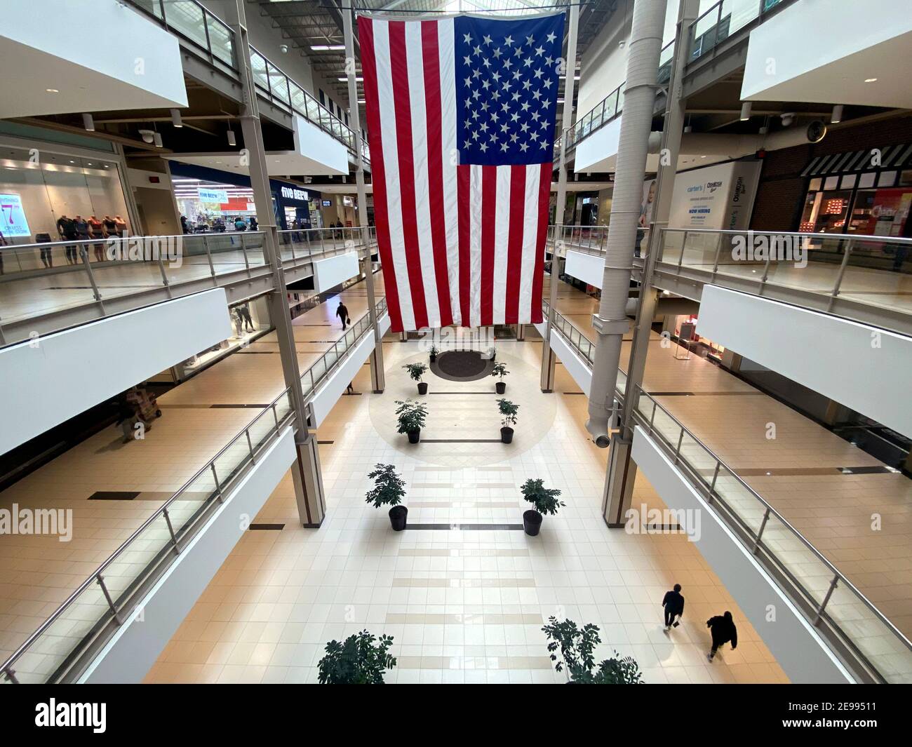 Shoppers walk through a nearly empty Palisades Center Mall retail center in  West Nyack, New York, U.S., February 3, 2021. REUTERS/Mike Segar Stock  Photo - Alamy