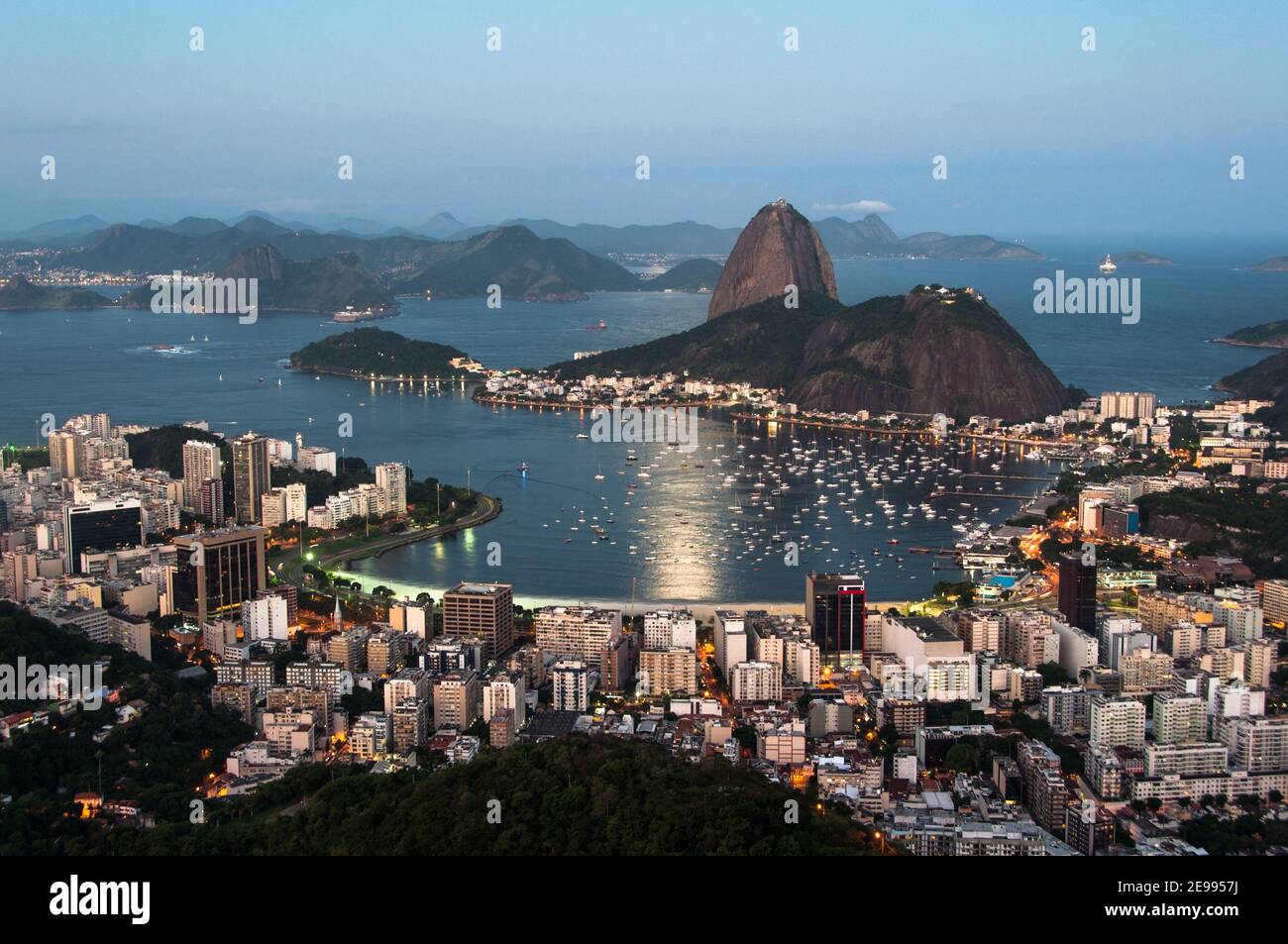 View of Botafogo district coastline with Guanabara bay waters full of  sailboats and vessels anchored nearby the Yatch Club under summer sunny day  Stock Photo - Alamy