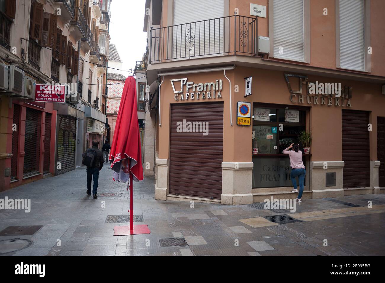 Malaga, Spain. 3rd Feb, 2021. A woman seen at a coffee take away shop outside in Malaga amid partial lockdown caused by coronavirus pandemic. Credit: Jesus Merida/SOPA Images/ZUMA Wire/Alamy Live News Stock Photo