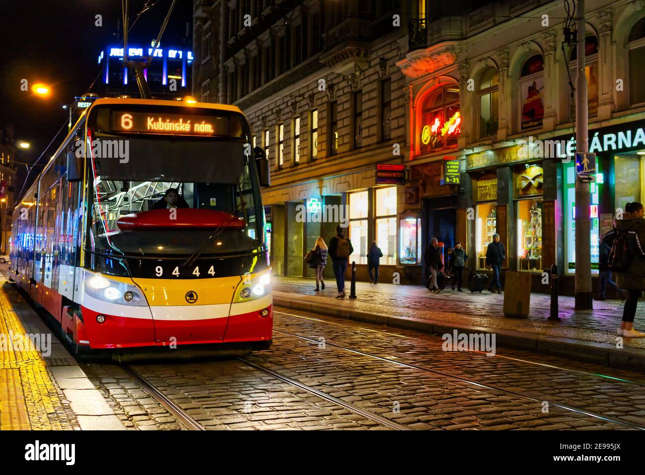 2019 11, Praha, Czech. Yellow white and red tram at night in the streets of  Prague. New Czech red tram number 6 Stock Photo - Alamy