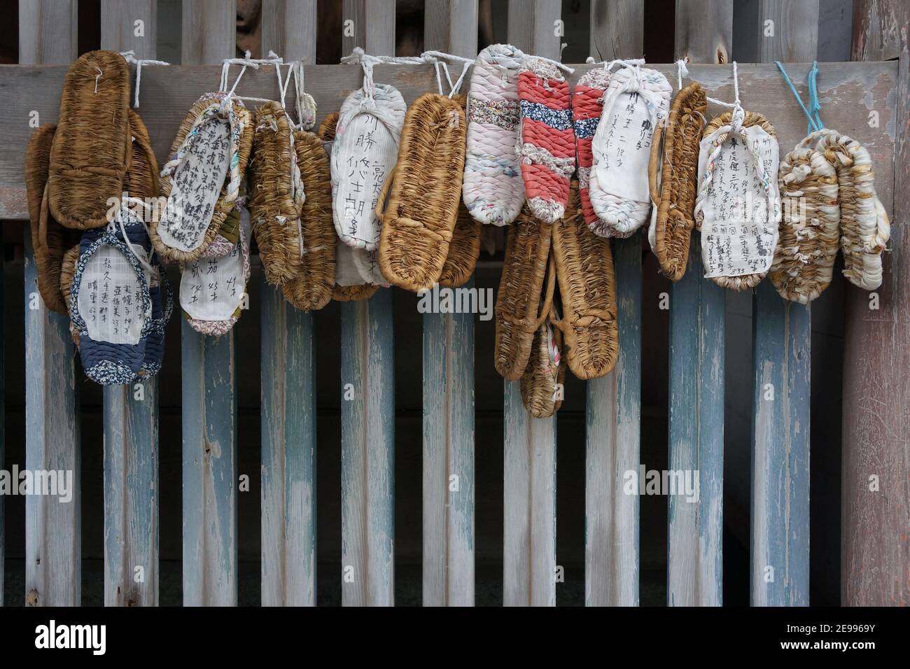 Traditional Waraji straw sandals hanging at a temple in Kyoto, Japan Stock Photo