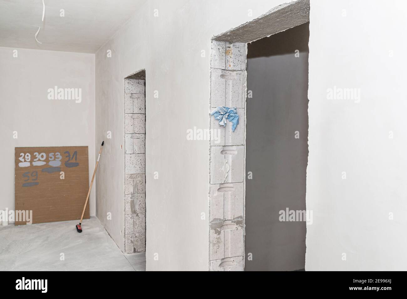 Freshly laid gypsum on the walls and ceiling of a newly built detached house. Stock Photo