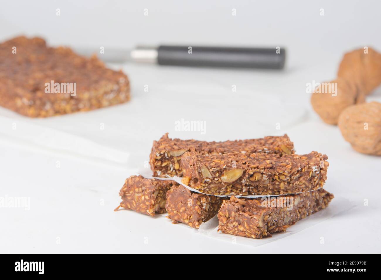 bar with chocolate protein and unsweetened nuts Stock Photo Alamy