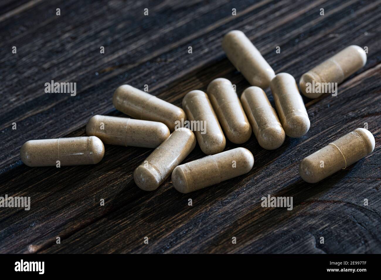 selective focus photo of psyllium husk capsules. dietary concept