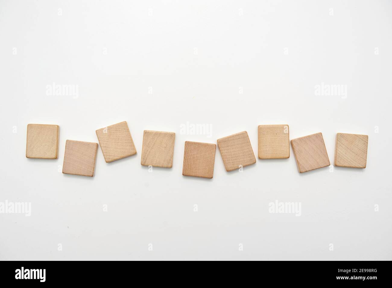 nine blank wooden tiles isolated Stock Photo