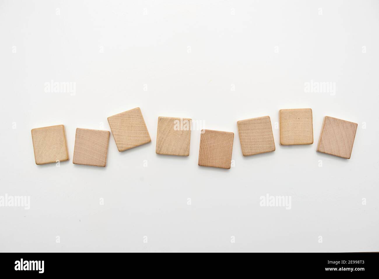 eight blank wooden tiles isolated Stock Photo