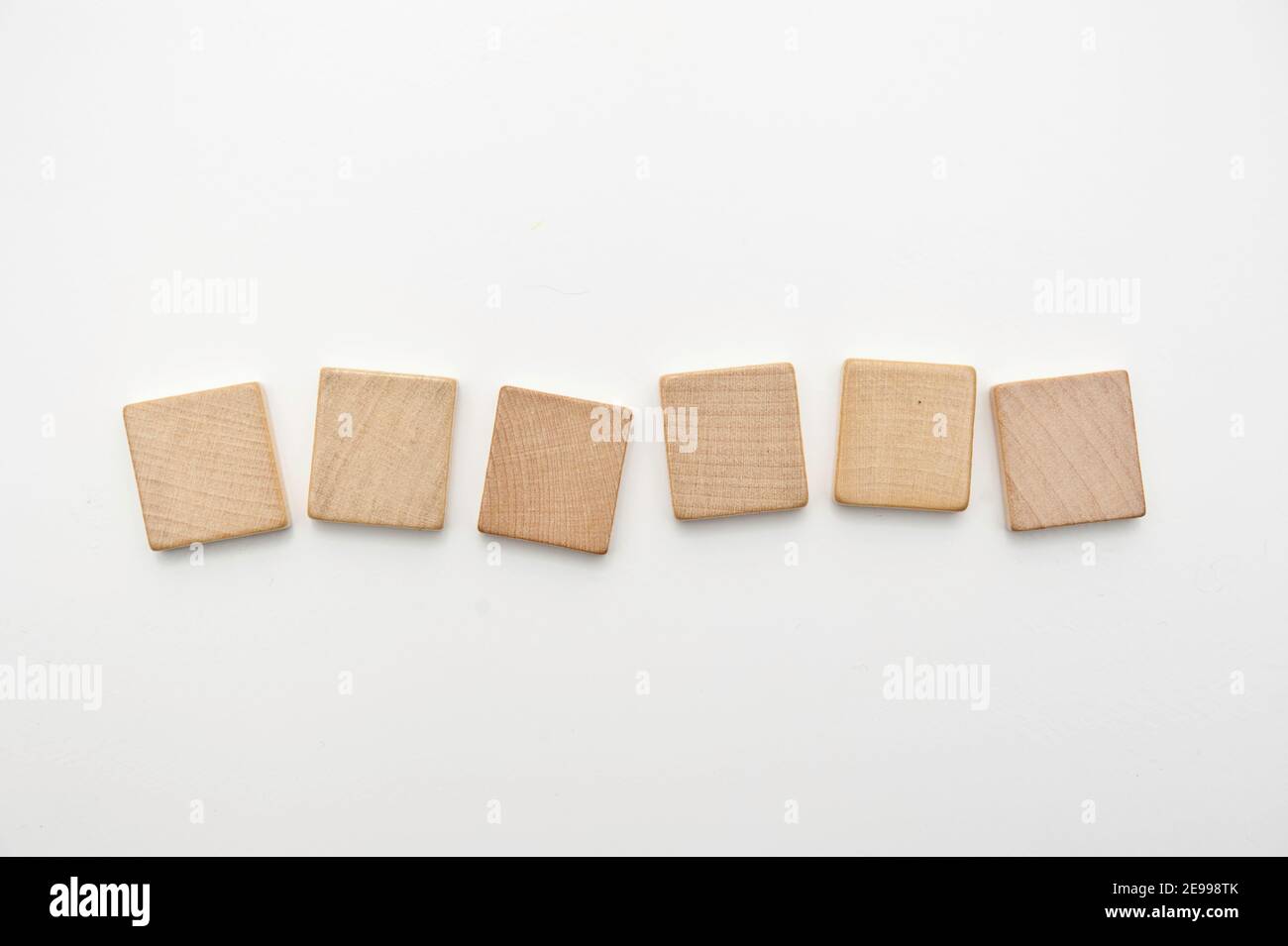 six blank wooden tiles isolated Stock Photo