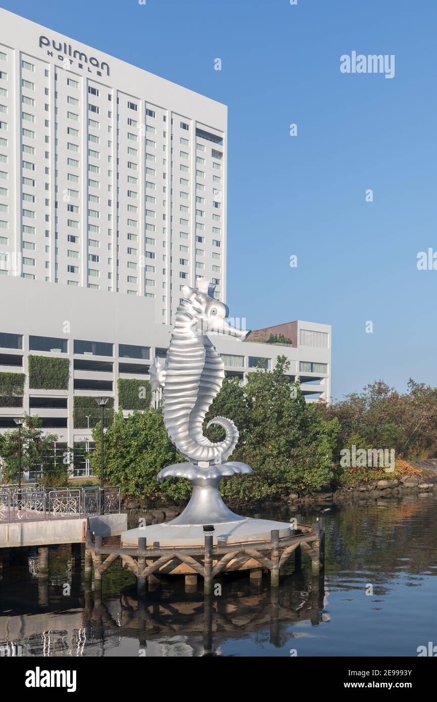 Seahorse mascot adopted by Miri in 1994 with teh Pullman hotel, Sarawak, Malaysia Stock Photo