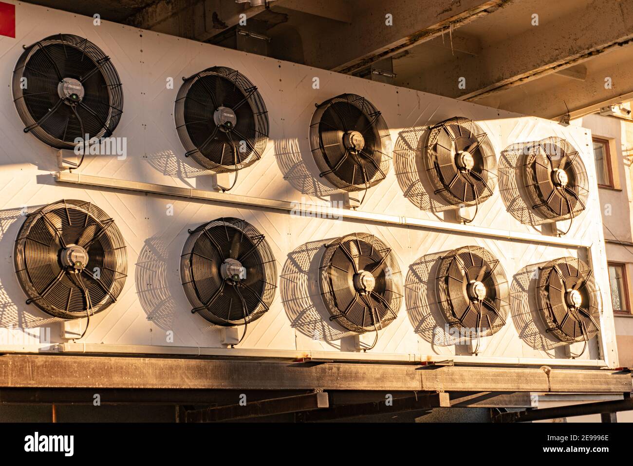 Condenser fan unit installed lined on the side of the building