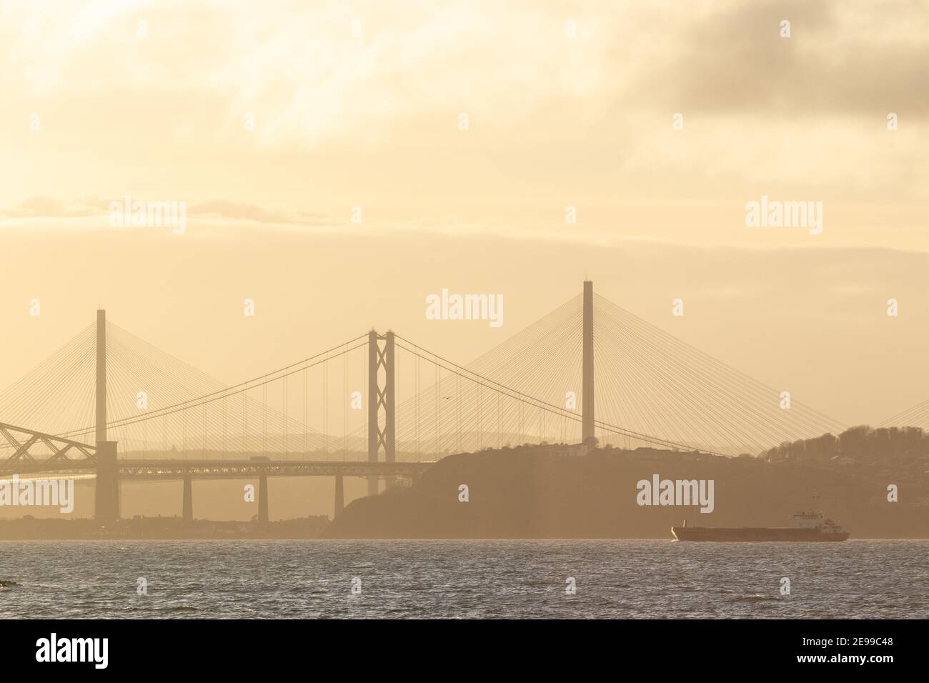 The Three Bridges over the Firth of Forth seen from Dalgety Bay Fife. Stock Photo