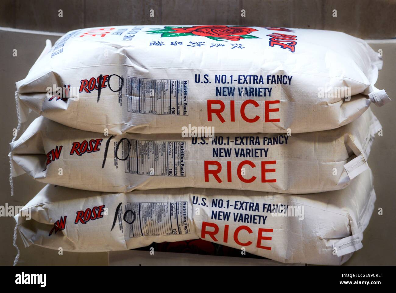 Bags of U.S.-grown New Rose brand rice outside a Japanese restaurant in the Japantown area of San Francisco, California. Stock Photo