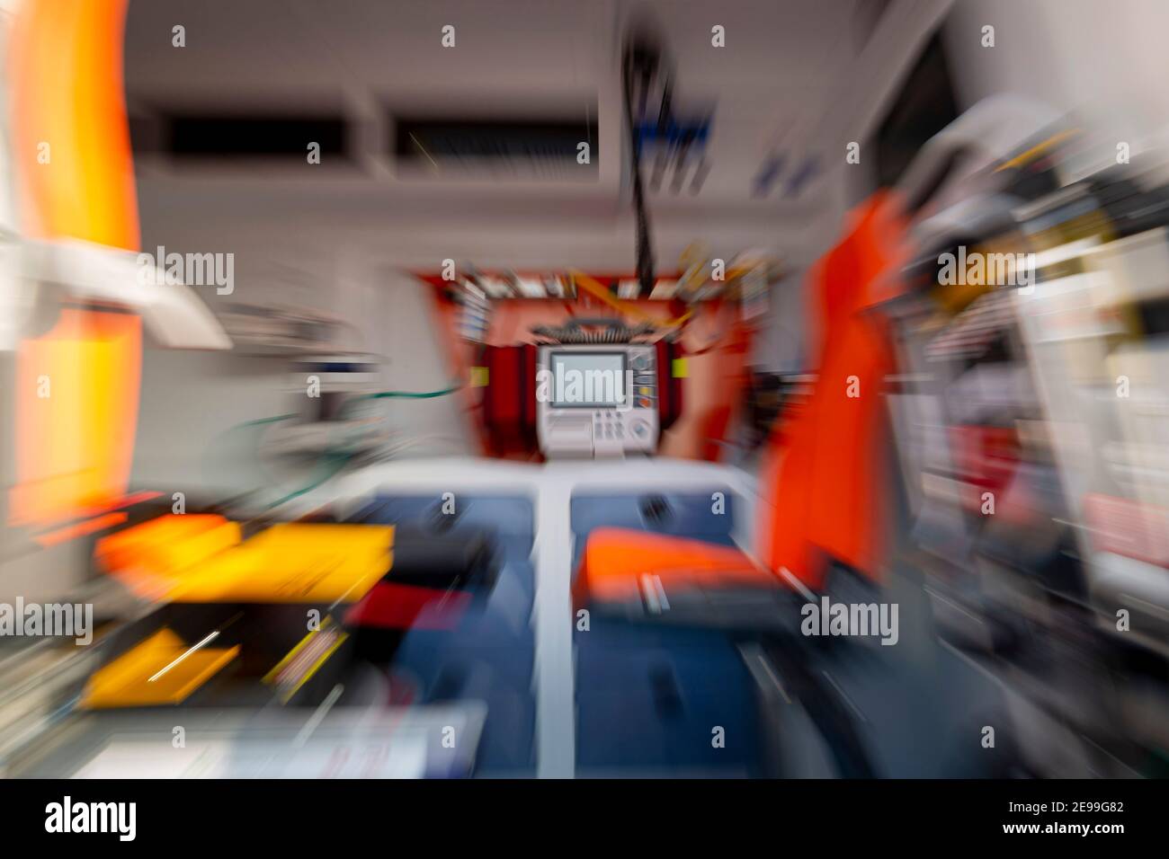 Defibrillator is seend inside of an ambulance. Defibrillation is a treatment for life-threatening cardiac dysrhythmias delivering a dose of electric c Stock Photo