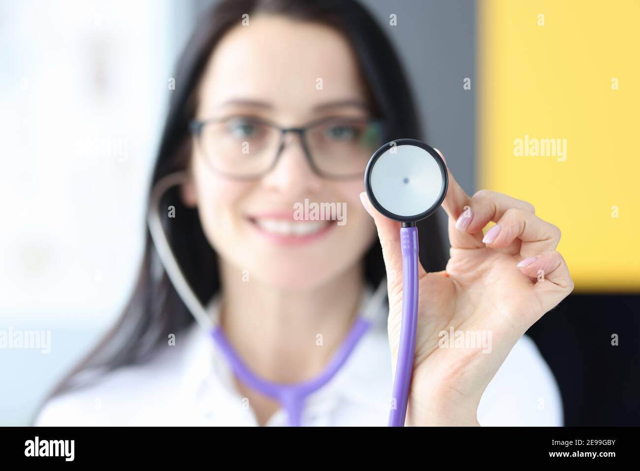 Female doctor holding stethoscope in clinic closeup Stock Photo Alamy