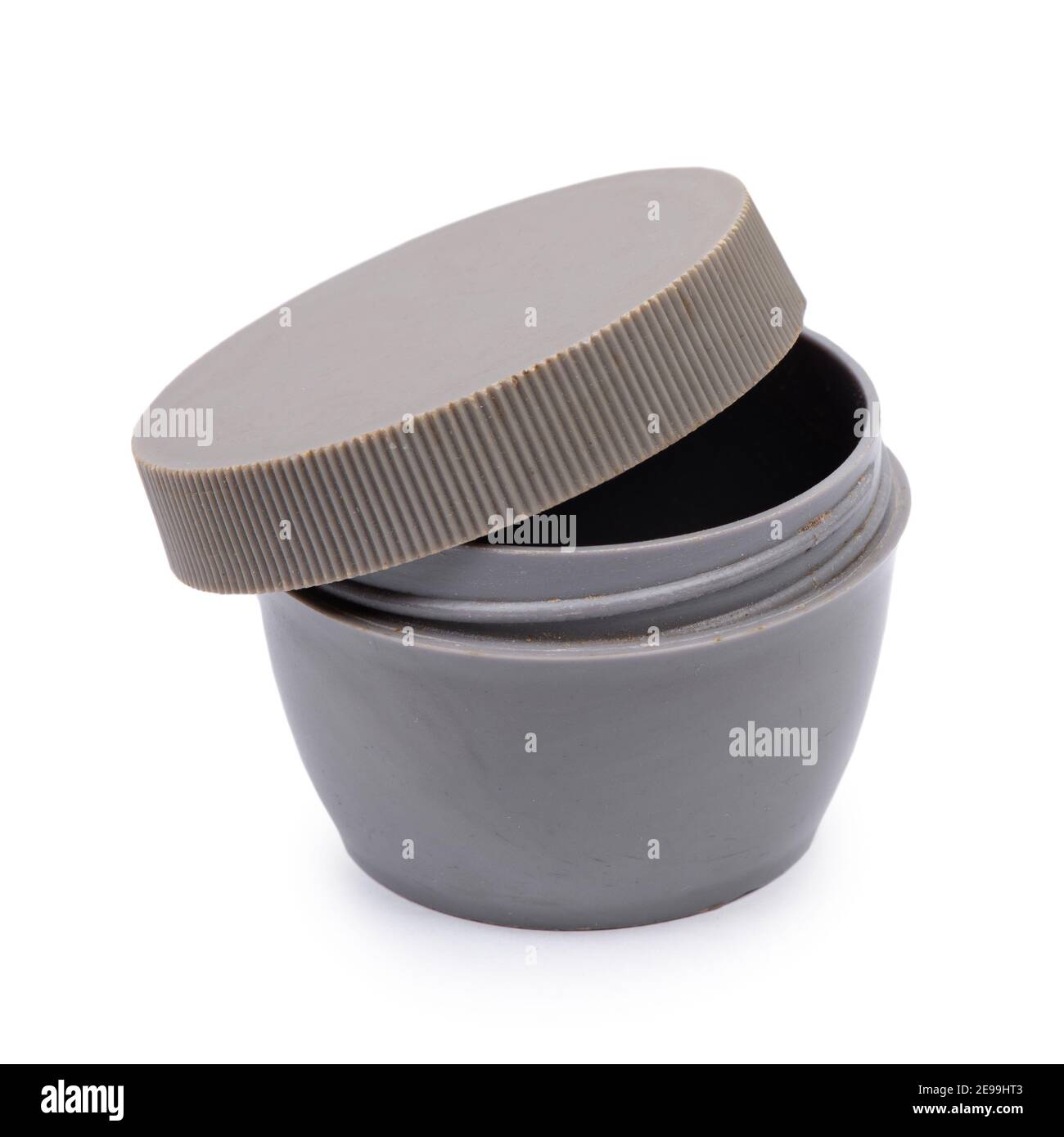 Old plastic jar with lid isolated on white background Stock Photo