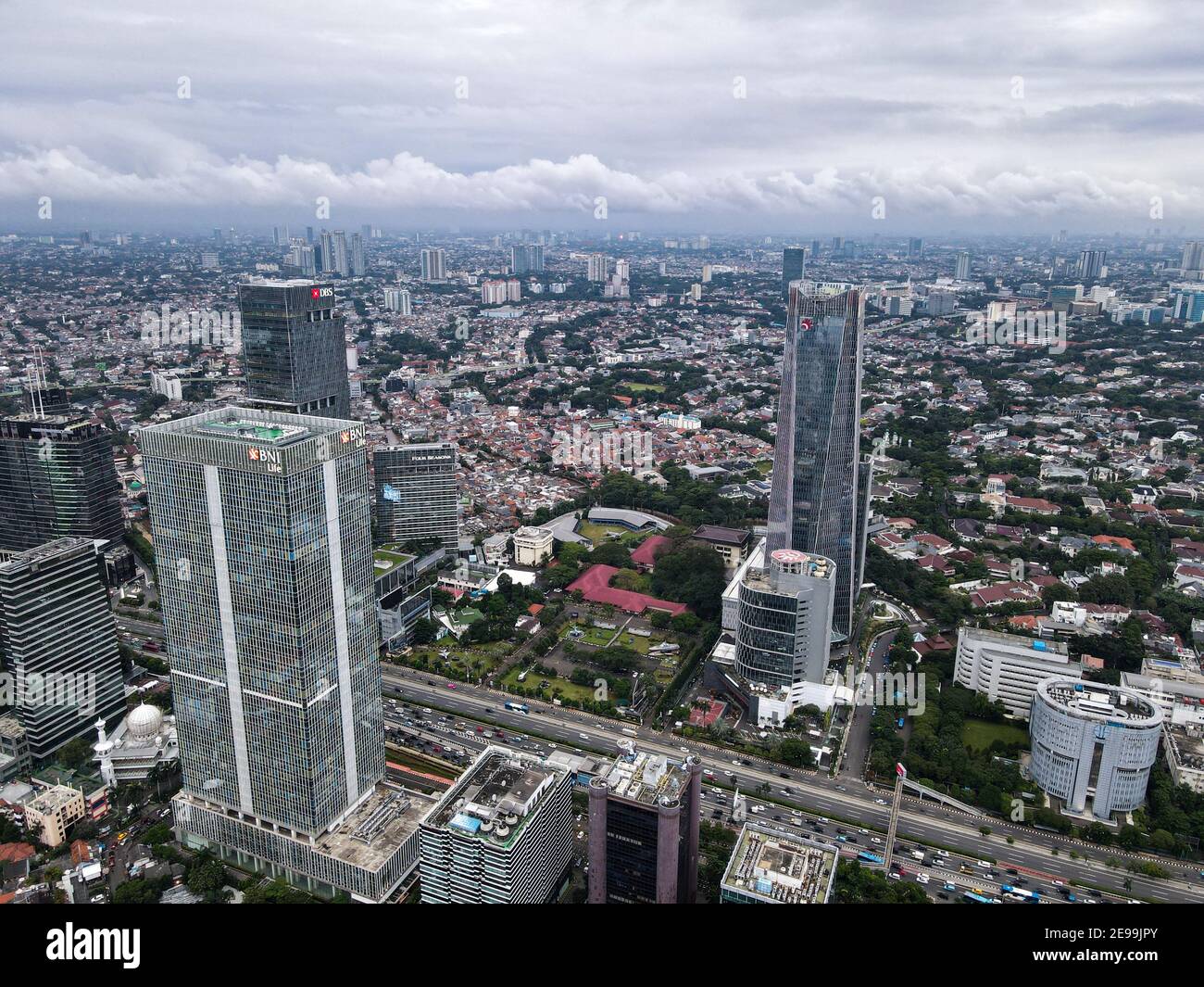 Aerial view of BNI Life building in Jakarta and noise cloud with