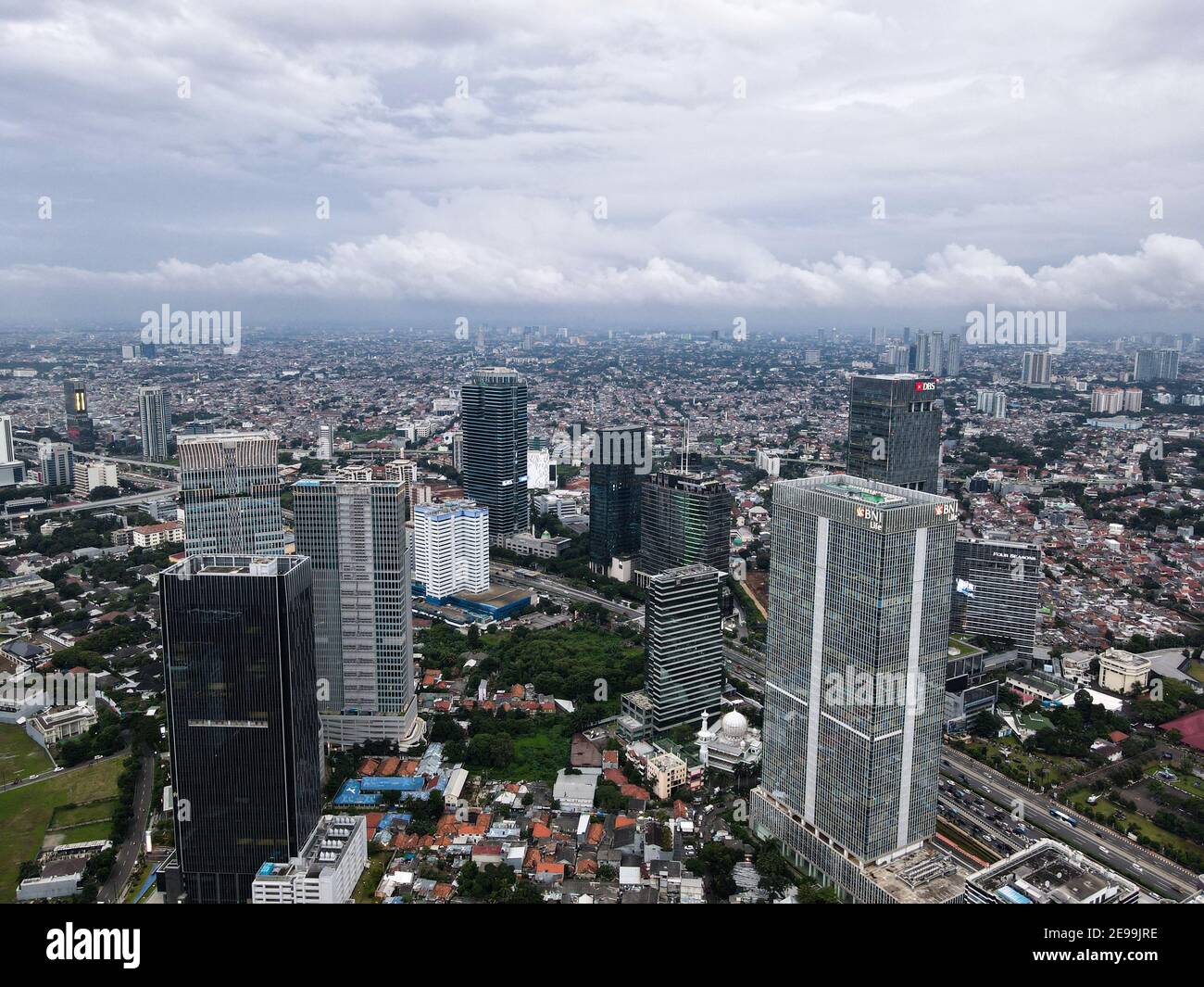 Aerial view of BNI Life building in Jakarta and noise cloud with