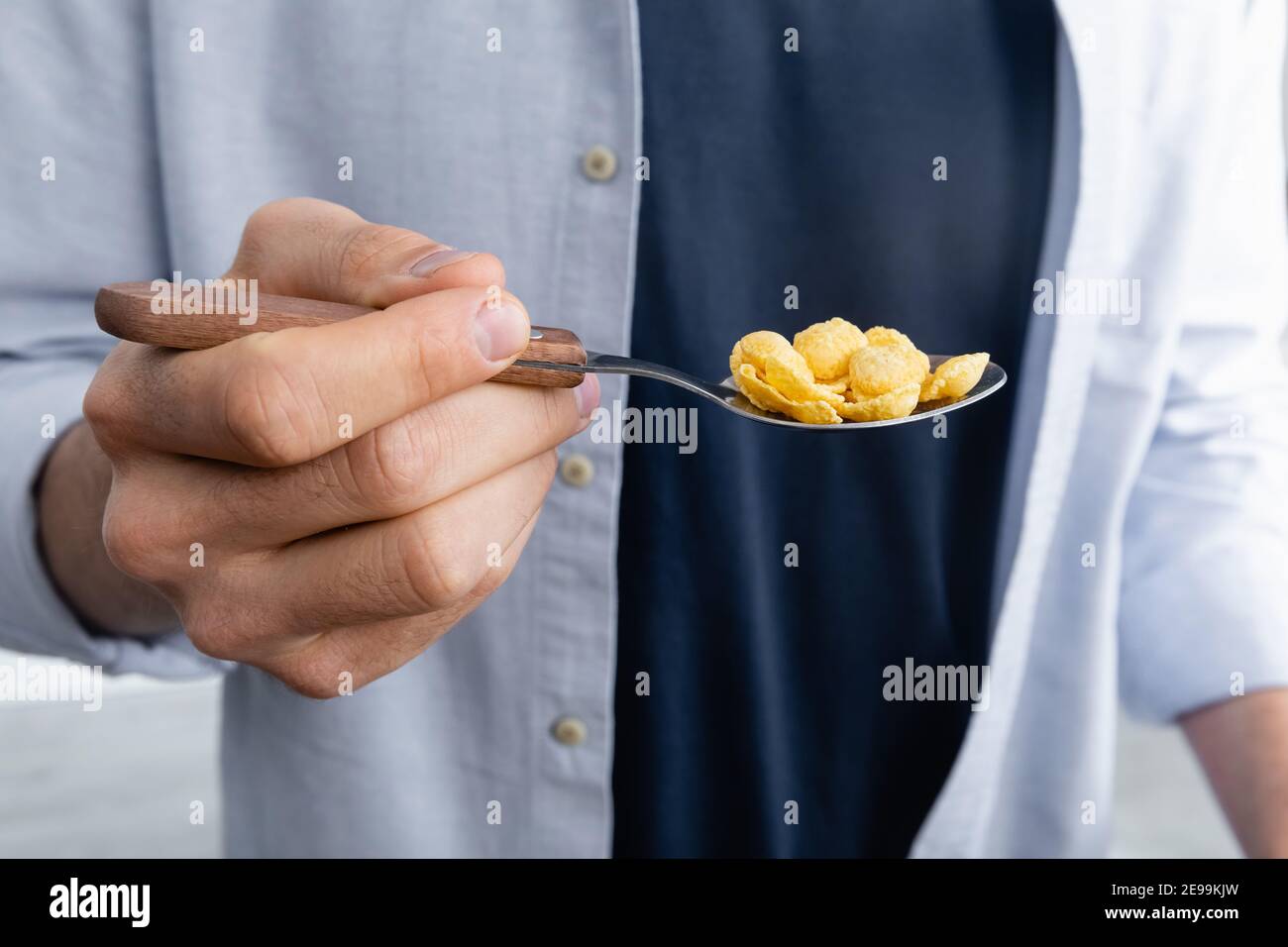 Happy man holding corn hi-res stock photography and images - Alamy