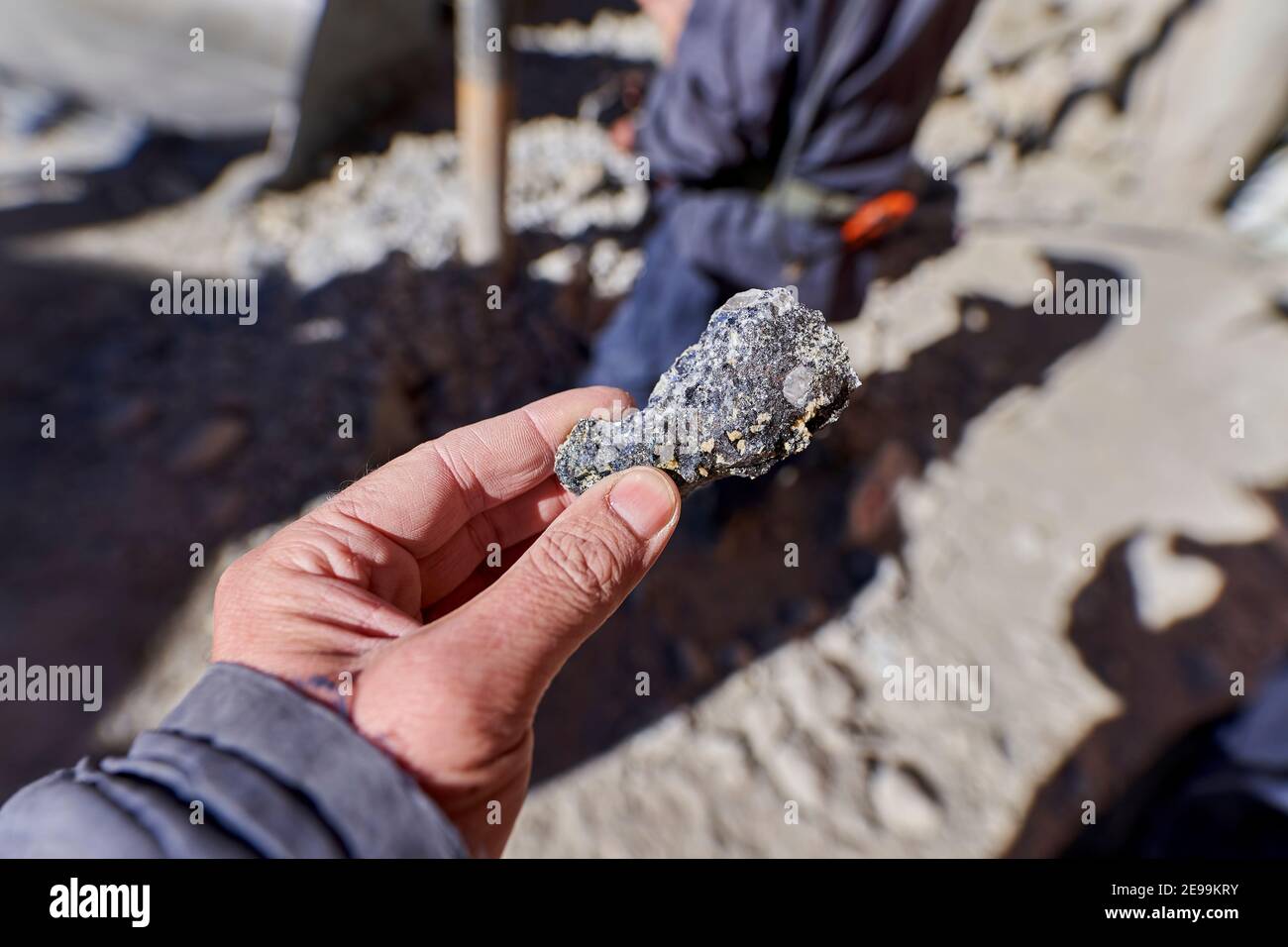 silver ore in shape of a small rock that needs to be processed to generate pure silver. Silver mining in Potosi in the andes mountains of Bolivia, Sou Stock Photo