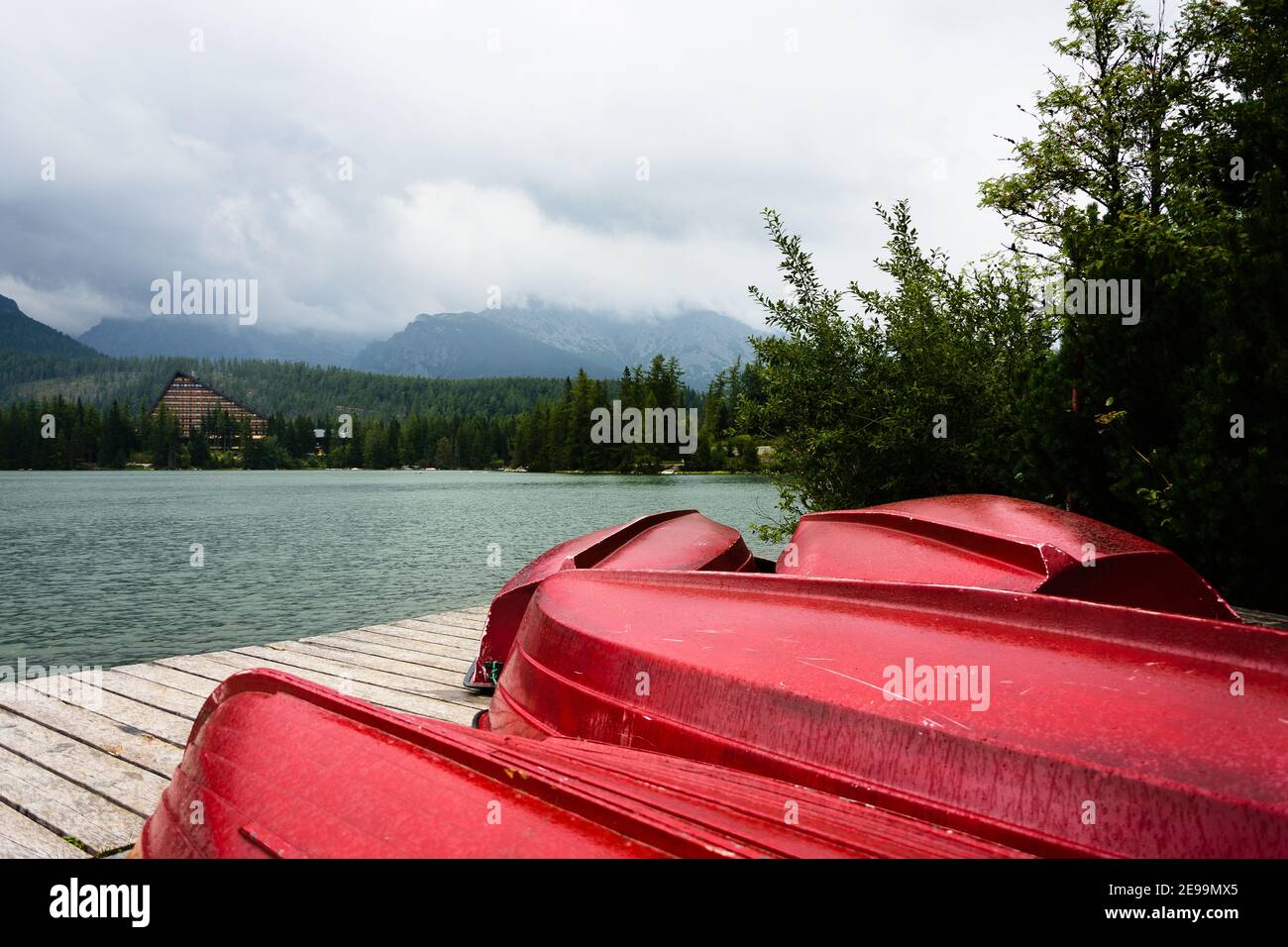 Upturned boats in front of a lake in Slovakia. Stock Photo