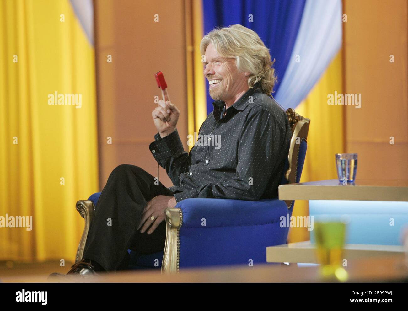 Sir Richard Branson attends Sebastien Cauet's TV Show 'La Methode Cauet', a program with a very young audience, during his one day visit in Paris to promote the launch of his phone service 'Virgin Mobile' on April 3, 2006. Photo by Thierry Boccon-Gibod/ABACAPRESS.COM Stock Photo