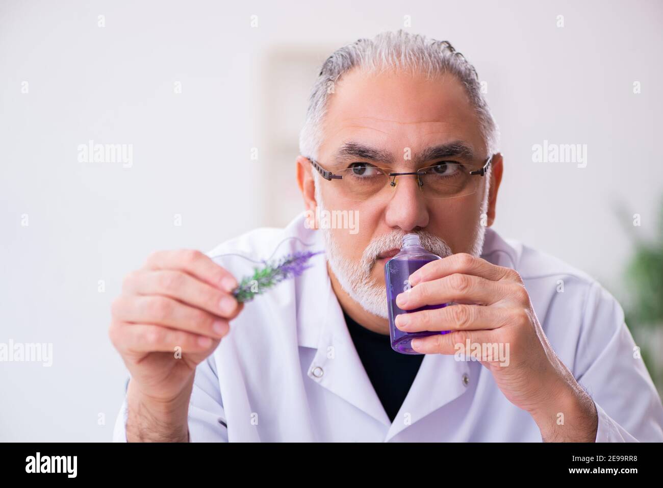Old chemist testing soap in the lab Stock Photo - Alamy