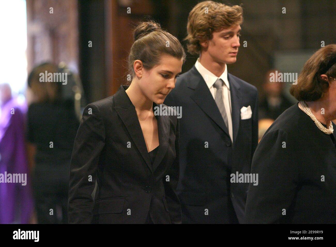 Charlotte and Pierre Casiraghi attend the mass commemorating the first anniversary of Prince Rainier's death in Saint-Nicolas Cathedral, in Monaco on April 6, 2006. Prince Rainier III died on April 6, 2005 after a serious illness, and his only son Prince Albert, succeeded him. Photo by Pool/ABACAPRESS.COM Stock Photo