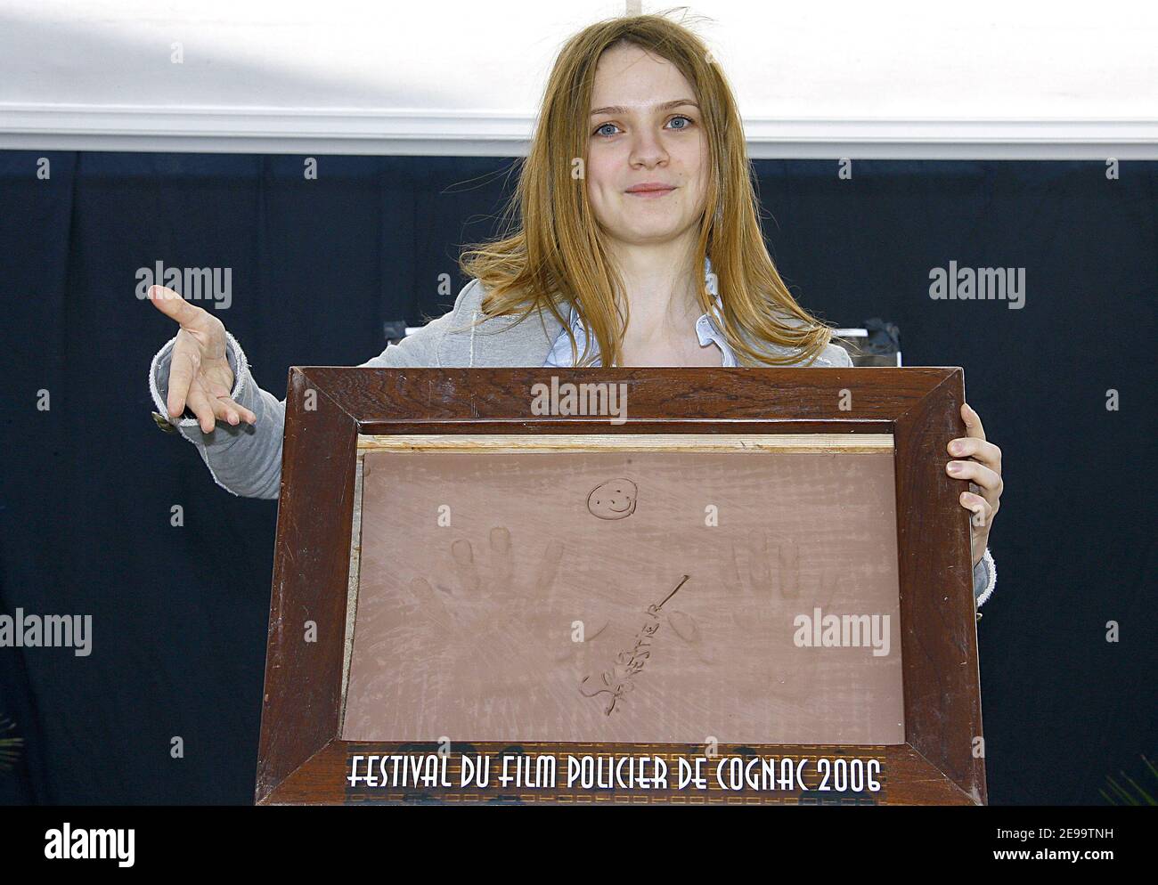 French actress Sara Forestier shows her hand-prints the 3rd day of the '24th Festival du Film Policier' (Mystery Film) held in Cognac, South-West of France on April 8, 2006. Photo by Patrick Bernard/ABACAPRESS.COM Stock Photo