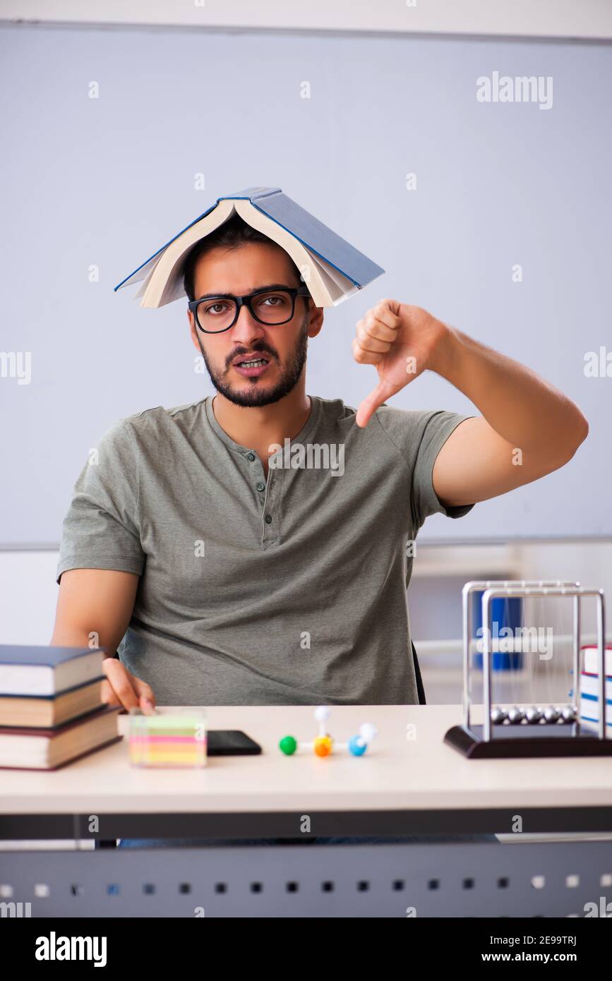 Getting Ready For Testing Young student preparing for exams in the classroom Stock Photo - Alamy