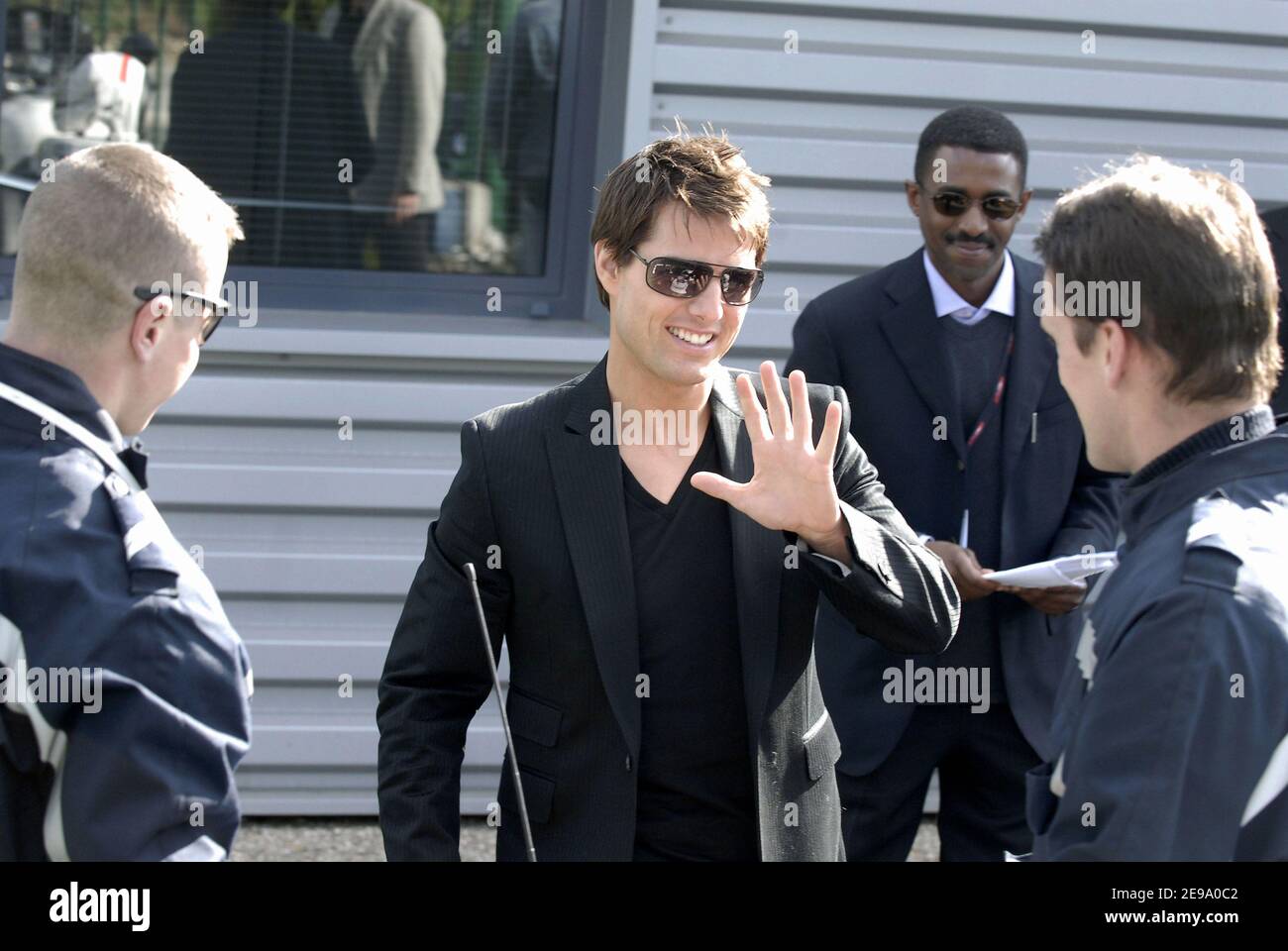 US actor Tom Cruise signs autograph on a 'Top Gun' DVD cover to a French  policeman at the heliport of Issy les Moulinaux, near Paris, France, on  April 26, 2006. Cruise decides